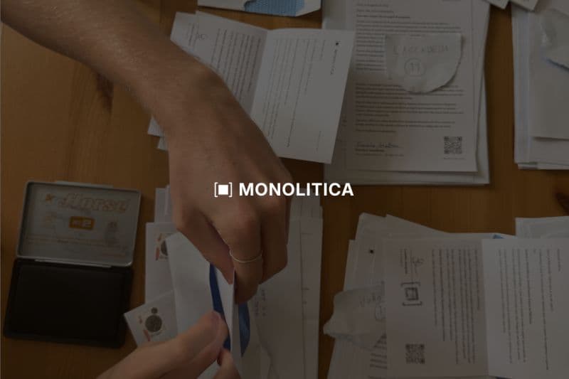 Handwritten letters from Monolitica's outreach campaign being prepared