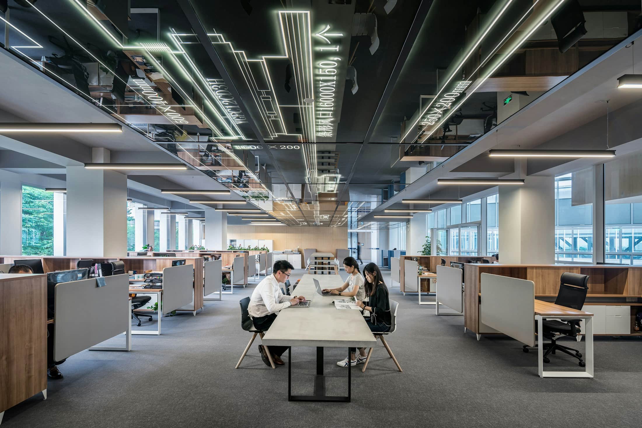 A team collaborating around a long table